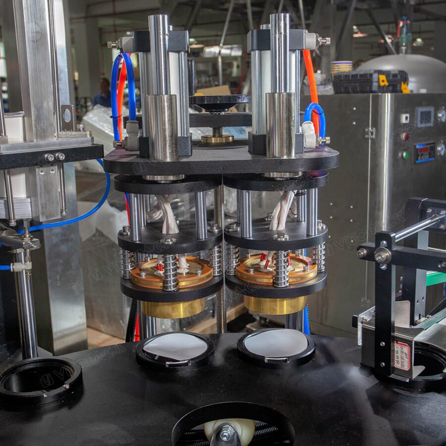 Snack Cup Filling Line with Dual-Head Sealer and Tapered Labeler main img 4
